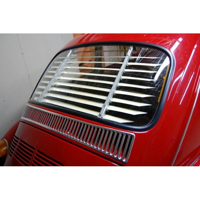 Aluminum vent trim below rear window (50 slots)