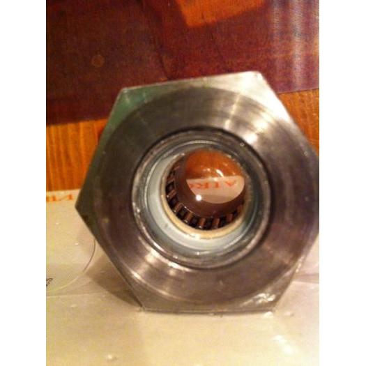 Stock gland nut including pilot bearing