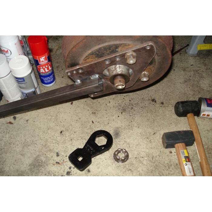 Rear axle and gland nut safety bar