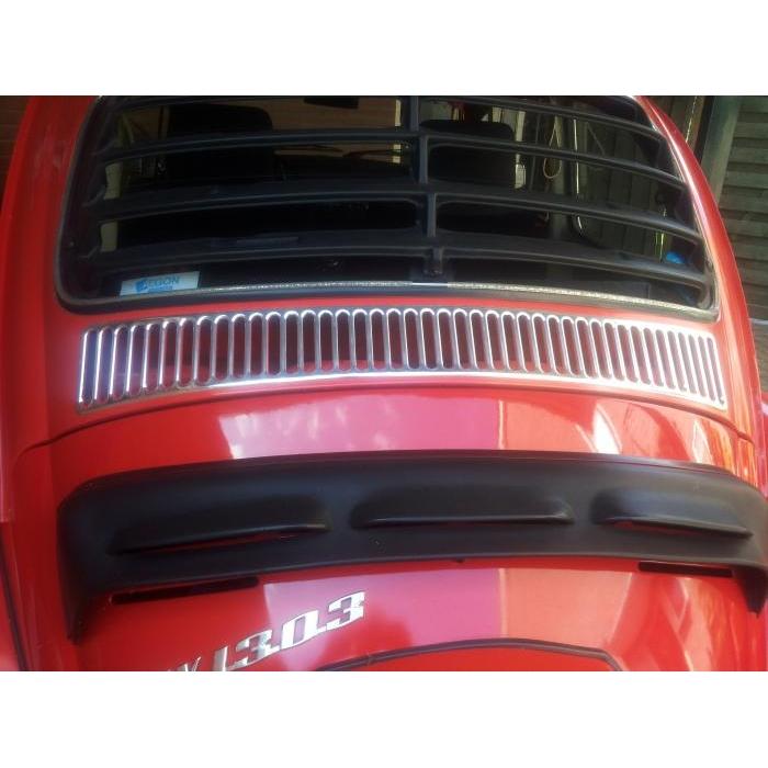 Aluminum vent trim below rear window (42 slots)