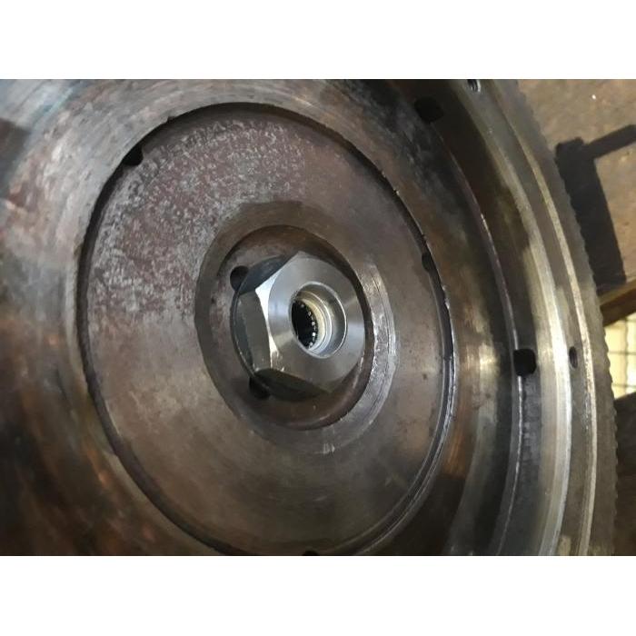 Stock gland nut including pilot bearing