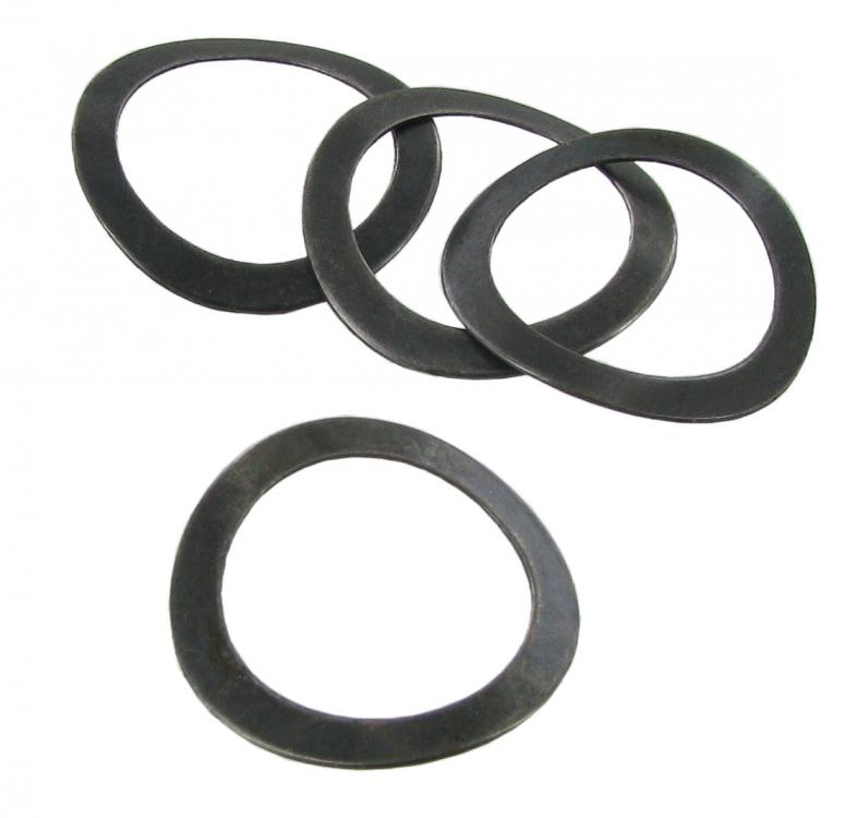 Keinuvipuakselin jousialuslevyt