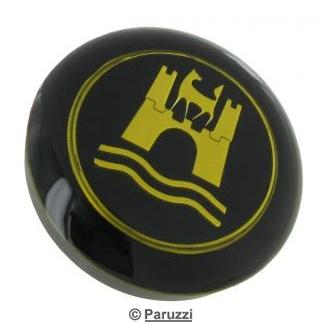 Horn button with a gold-colored emblem