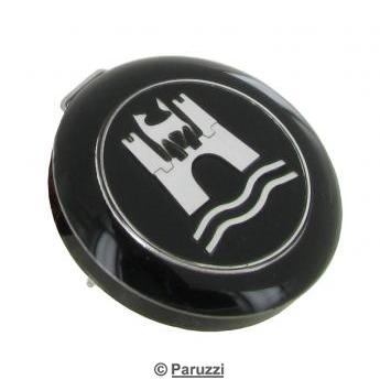 Horn button with a silver-colored emblem